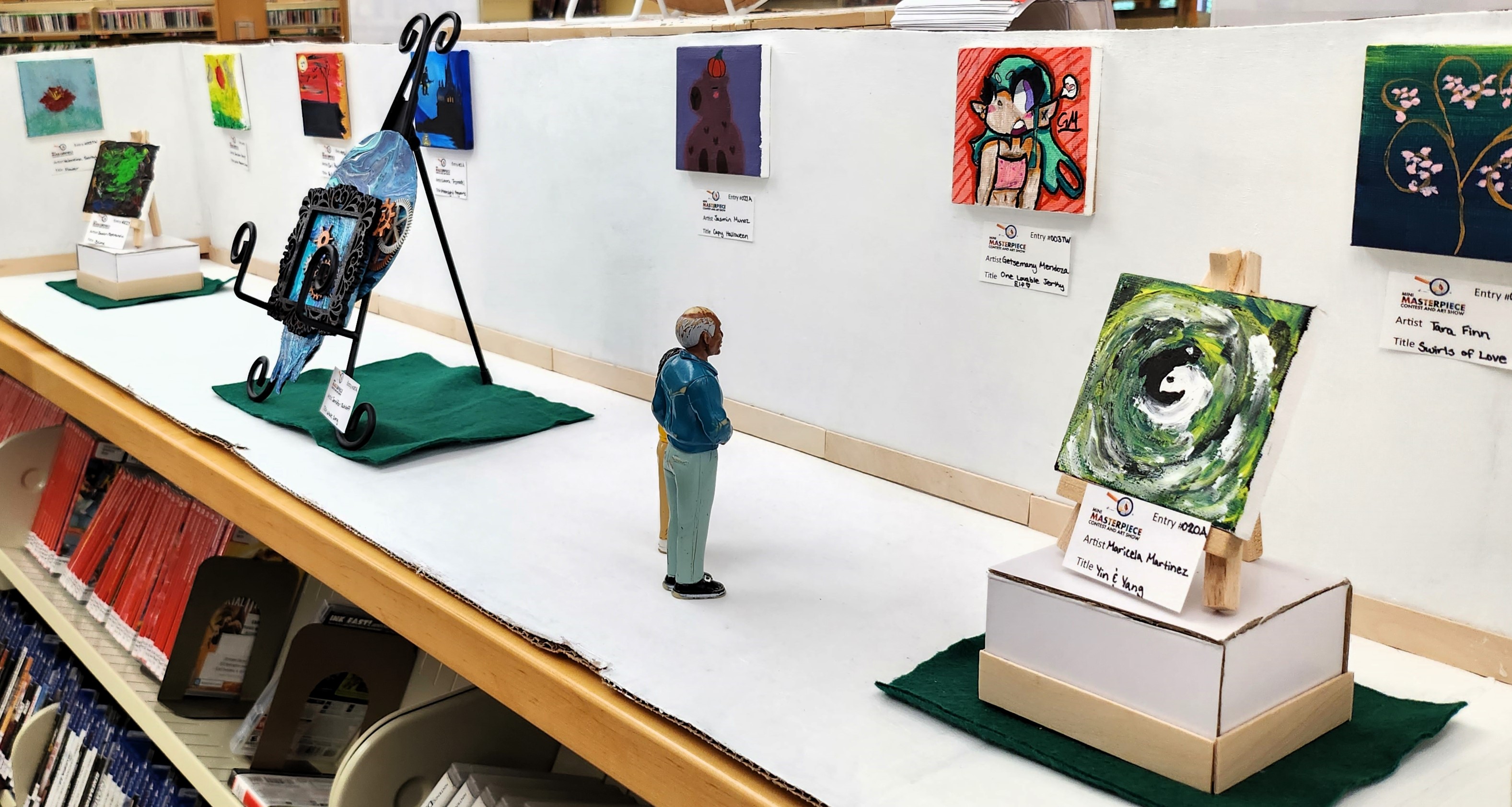 Mini Masterpiece Contest and Art Show showing small canvases wand small figures