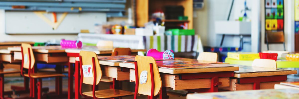 Colorful image of empty school classroom.