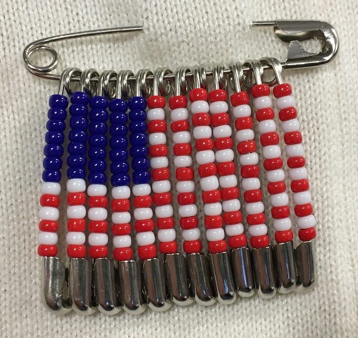 Beaded American flag pin made with safety pins