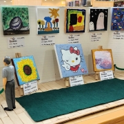 Mini Masterpiece Contest and Art Show showing small canvases with various subjects