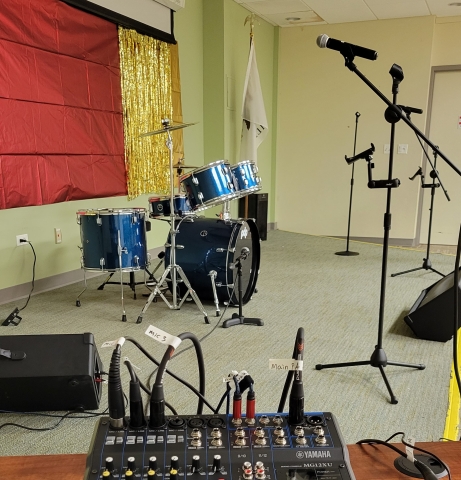 stage and drums in the center