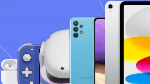 Various Tech Devices Lined Up Horizontally Over A Lilac Background