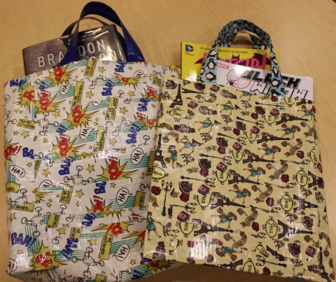 Duct tape book bag made out of superhero duct tape, and duct tape book bag made out of Paris duct tape