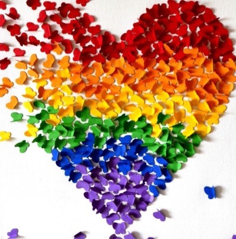 Pride mosaic of a heart composed of small butterflies